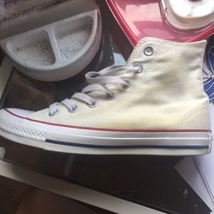 Yellow high top converse